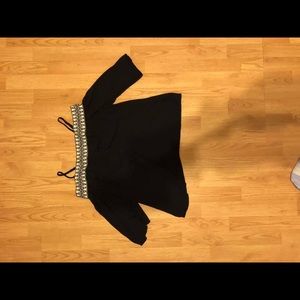 Black off the shoulder top with spaghetti straps